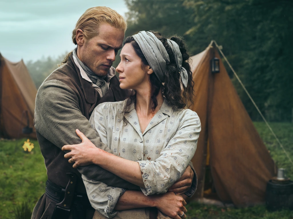 sam_heughan_and_caitriona_balfe_season_7_outlander_jamie_and_claire_fraser.webp